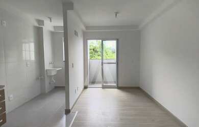 Imagem: O apartamento possui 2 Dormitórios, 1 Banheiro, 1 Vaga na garagem