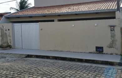 Imagem: A casa possui 3 Dormitórios, 3 Banheiros, 3 Vagas na garagem