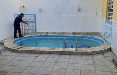 Imagem: A casa possui 4 Dormitórios, 3 Banheiros e 4 Vagas na garagem