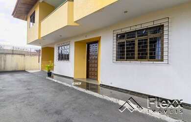 Imagem: A casa possui 3 Dormitórios, 3 Banheiros, 2 Vagas na garagem