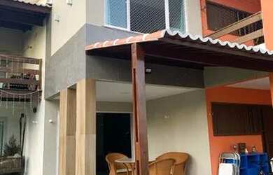 Imagem: A casa possui 3 Dormitórios, 1 Vaga na garagem e está localizado