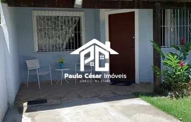 Imagem: A casa possui 2 Dormitórios, 1 Banheiro, 2 Vagas na garagem