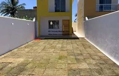 Imagem: A casa possui 2 Dormitórios, 3 Banheiros, 1 Vaga na garagem