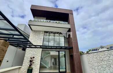 Imagem: A casa em condomínio possui 5 Dormitórios, 5 Banheiros, 2