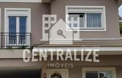 Imagem: A casa possui 3 Dormitórios, 1 Banheiro, 2 Vagas na garagem