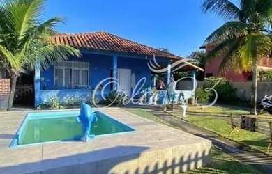 Imagem: A casa possui 4 Dormitórios, 2 Banheiros, 5 Vagas na garagem