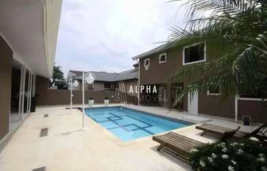 Imagem: A casa em condomínio possui 4 Dormitórios, 4 Banheiros, 5