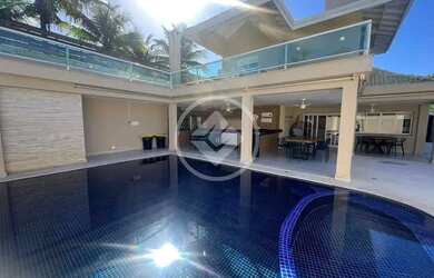 Imagem: A casa possui 5 Dormitórios, 5 Banheiros, 4 Vagas na garagem