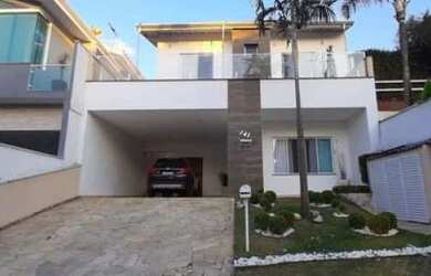 Imagem: A casa em condomínio e possui Dormitórios, Suítes, Banheiros