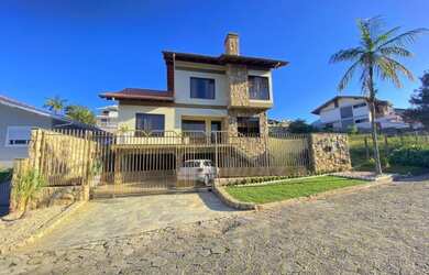 Imagem: A casa em condomínio possui 3 Dormitórios, 4 Banheiros, 3