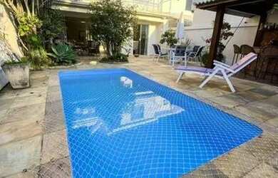 Imagem: A casa em condomínio possui 5 Dormitórios, 4 Banheiros, 4