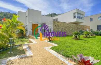 Imagem: A casa em condomínio possui 4 Dormitórios, 5 Banheiros, 5