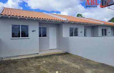 Imagem: A casa possui 2 Dormitórios, 1 Banheiro, 1 Vaga na garagem