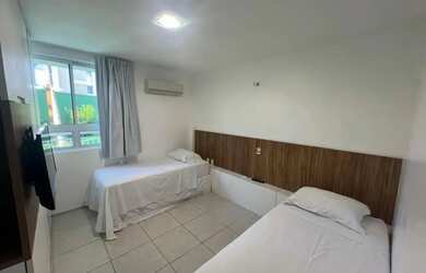 Imagem 9: Apartamento térreo, pé na areia, 03 suítes, sala com varanda, cozinha planejada, área laze