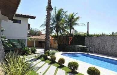 Imagem: A casa em condomínio possui 5 Dormitórios, 5 Banheiros, 5