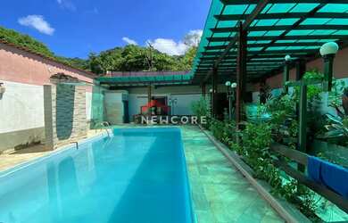 Imagem: A casa possui 3 Dormitórios, 4 Banheiros, 4 Vagas na garagem