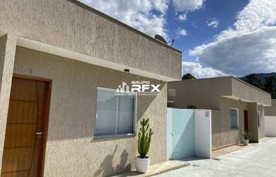 Imagem: A casa possui 2 Dormitórios, 1 Banheiro, 1 Vaga na garagem