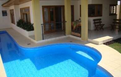 Imagem: A casa em condomínio possui 5 Dormitórios, 3 Banheiros, 4