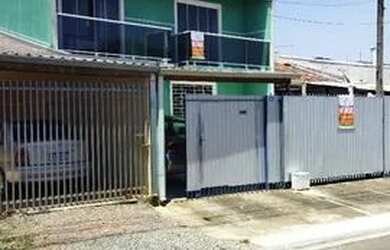 Imagem: A casa possui 3 Dormitórios, 3 Banheiros, 4 Vagas na garagem