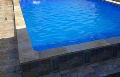 Imagem: A casa possui 2 Dormitórios, 3 Vagas na garagem, Imóvel novo