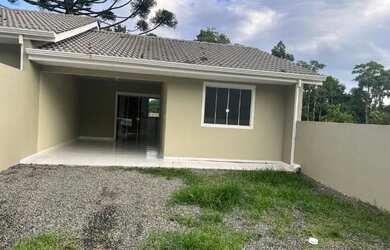 Imagem: A casa possui 2 Dormitórios, 1 Banheiro, 1 Vaga na garagem