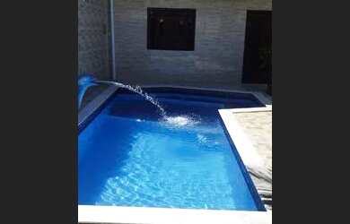 Imagem: A casa possui 4 Dormitórios, 4 Banheiros, 1 Vaga na garagem