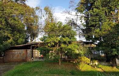 Imagem: A casa possui 3 Dormitórios, 1 Banheiro, 1 Vaga na garagem