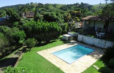 Imagem: A casa possui 5 Dormitórios, 5 Banheiros, 5 Vagas na garagem