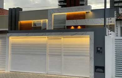 Imagem: A casa possui 3 Dormitórios, 4 Banheiros, 2 Vagas na garagem