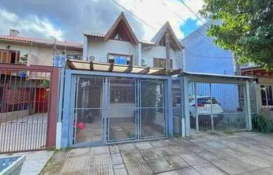 Imagem: A casa possui 2 Dormitórios, 2 Banheiros, 1 Vaga na garagem