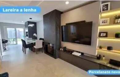 Imagem: A casa possui 3 Dormitórios, 3 Banheiros, 3 Vagas na garagem