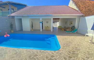 Imagem: A casa possui 5 Dormitórios, 5 Banheiros, 5 Vagas na garagem