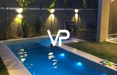 Imagem: A casa possui 4 Dormitórios, 5 Banheiros, 4 Vagas na garagem