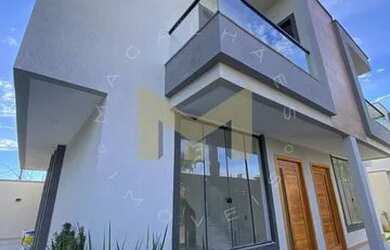 Imagem: A casa possui 3 Dormitórios, 2 Banheiros, 2 Vagas na garagem