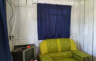 Imagem: A casa possui 1 Dormitório, 1 Banheiro, 5 Vagas na garagem