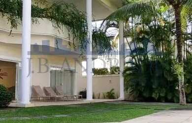 Imagem: A casa possui 5 Dormitórios, 5 Banheiros, 5 Vagas na garagem