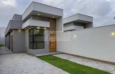 Imagem: A casa possui 3 Dormitórios, 3 Banheiros, 3 Vagas na garagem