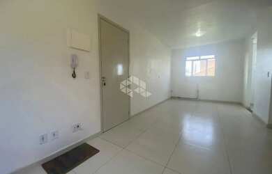 Imagem: O apartamento possui 3 Dormitórios, 1 Banheiro, 1 Vaga na garagem