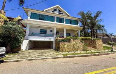 Imagem: A casa em condomínio possui 5 Dormitórios, 5 Banheiros, 5