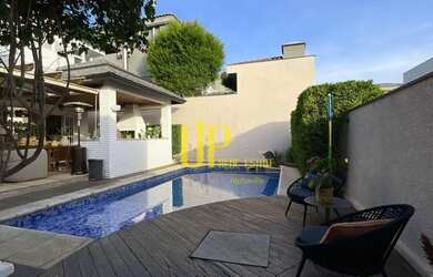 Imagem: A casa em condomínio possui 5 Dormitórios, 5 Banheiros, 2