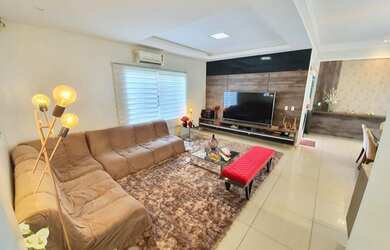 Imagem: A casa possui 4 Dormitórios, 5 Banheiros, 5 Vagas na garagem