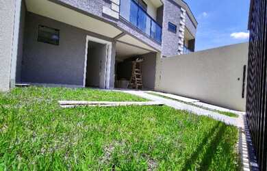 Imagem: A casa possui 3 Dormitórios, 3 Banheiros, 2 Vagas na garagem