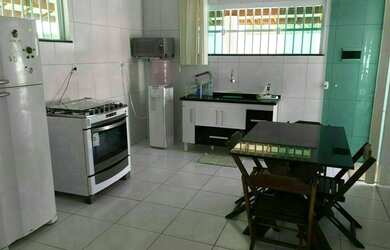 Imagem: A casa possui 4 Dormitórios, 5 Vagas na garagem e está localizado