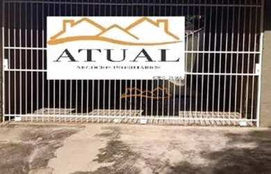 Imagem: A casa possui 2 Dormitórios, 1 Banheiro, 2 Vagas na garagem