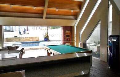 Imagem: A casa possui 4 Dormitórios, 5 Banheiros, 5 Vagas na garagem