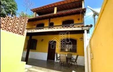 Imagem: A casa possui 3 Dormitórios, 3 Banheiros, 3 Vagas na garagem