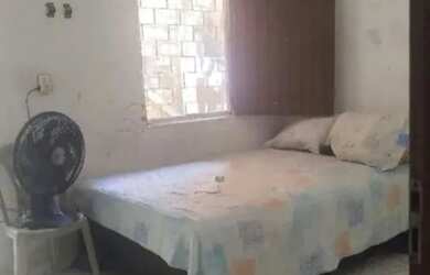 Imagem: A casa possui 2 Dormitórios, 2 Banheiros, 3 Vagas na garagem