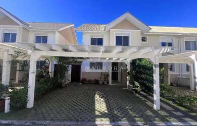 Imagem: A casa em condomínio possui 3 Dormitórios, 1 Banheiro, 2 Vagas