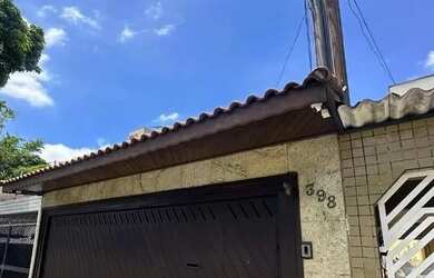 Imagem: A casa possui 3 Dormitórios, 2 Banheiros, 2 Vagas na garagem