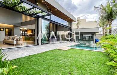 Imagem: A casa em condomínio possui 4 Dormitórios, 5 Banheiros, 3